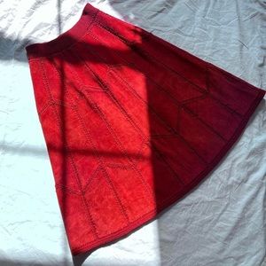 Red acrylic knit/ cowhide split leather midi skirt